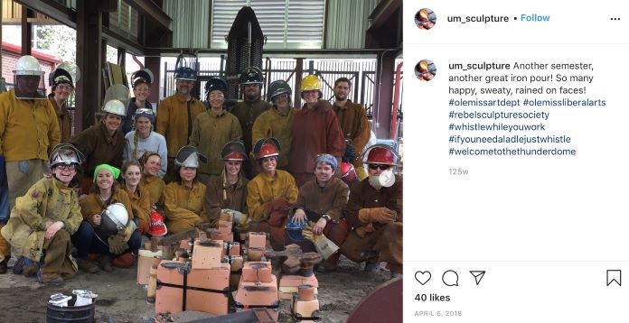 Sculpture Instagram post featuring faculty and students posing after an iron pour.